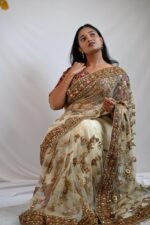 Elegant Cream Net Saree with Maroon Floral Embroidered Red Blouse & Zari Border - Image 2