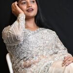 Elegant Ivory White Sequin Embroidered Net Saree with Intricate Silver Work