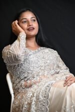 Elegant Ivory White Sequin Embroidered Net Saree with Intricate Silver Work