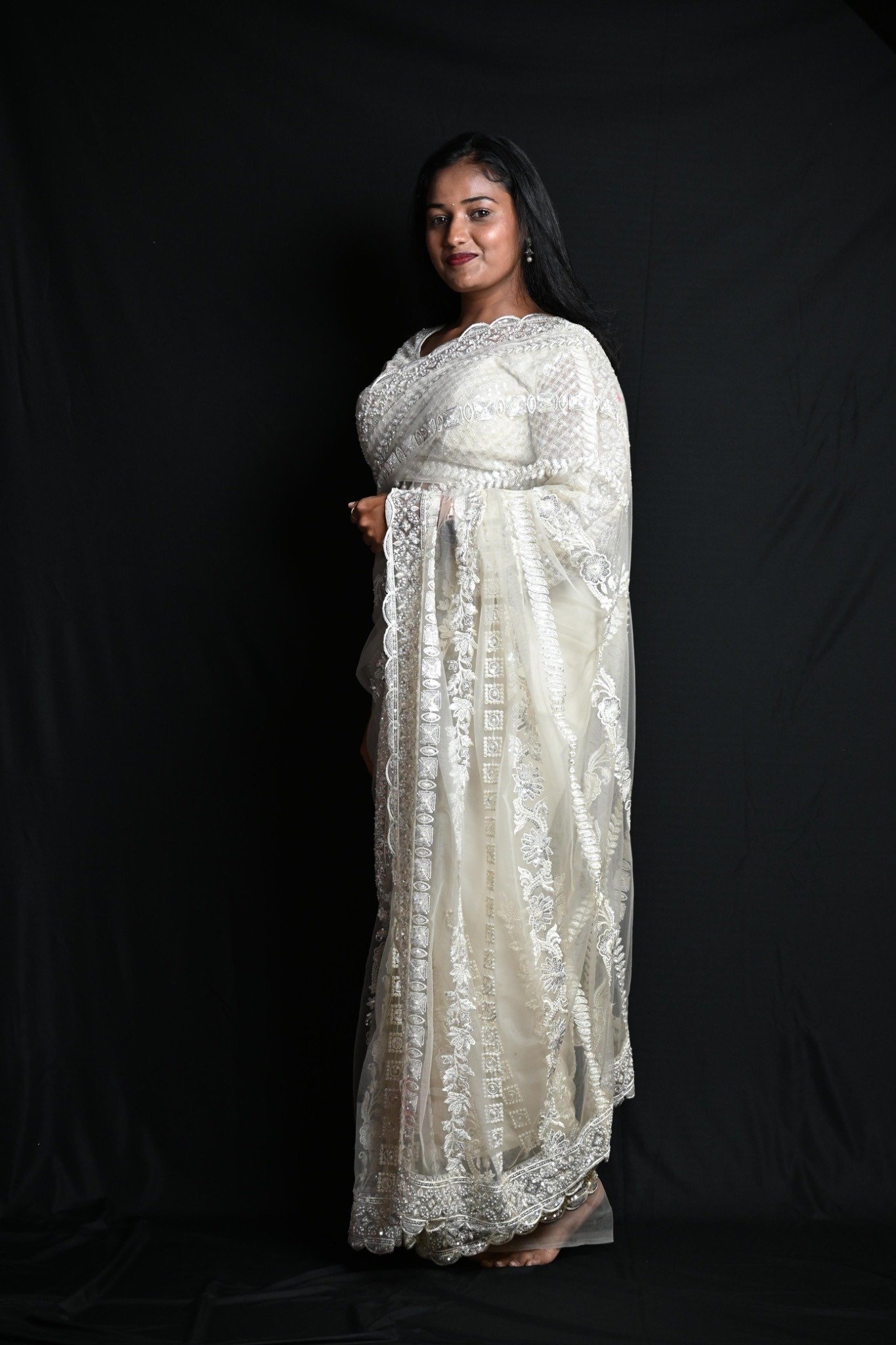 white_saree_image_1 Premium Ivory White Designer Saree with Intricate Silver Embroidery & Sequin Work - Image 1